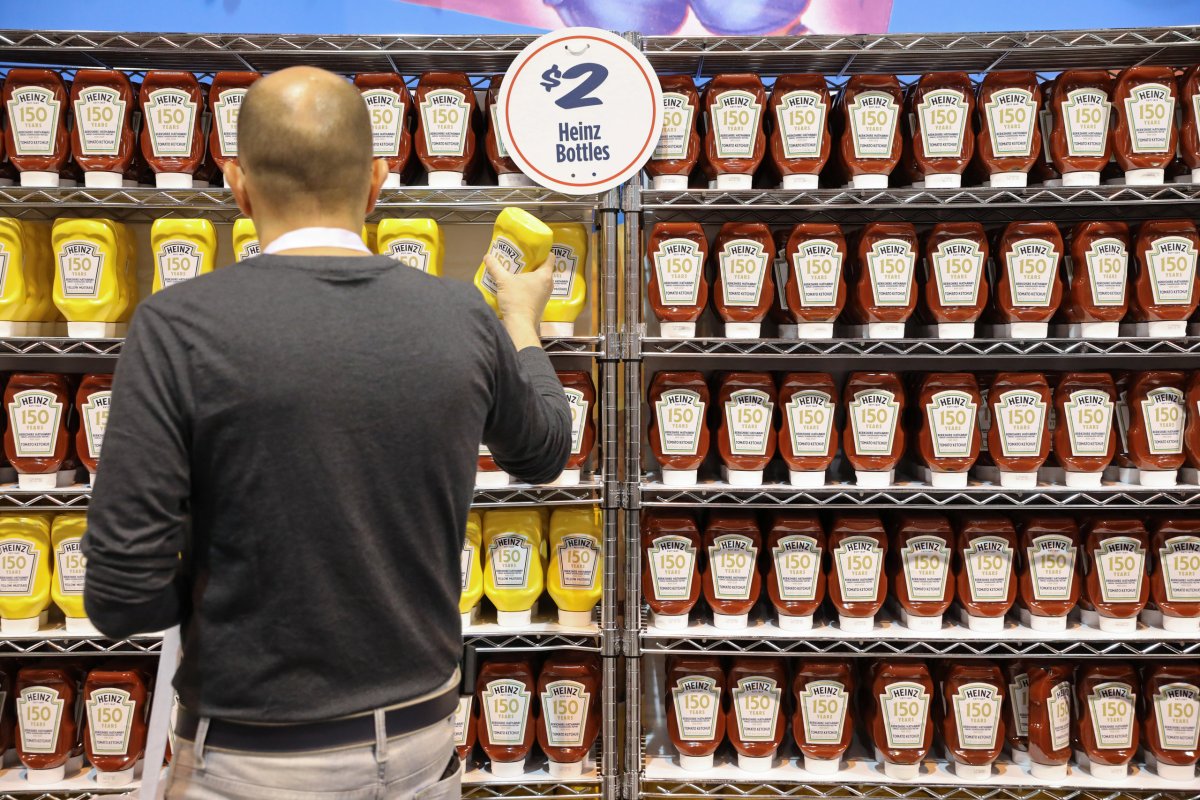 Shareholders shop for discounted products at the Kraft Heinz booth