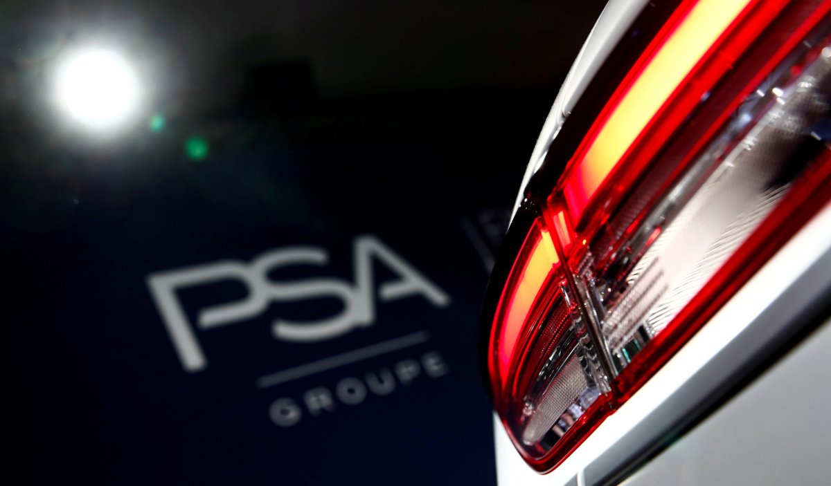 FILE PHOTO: A PSA Group logo is seen behind a