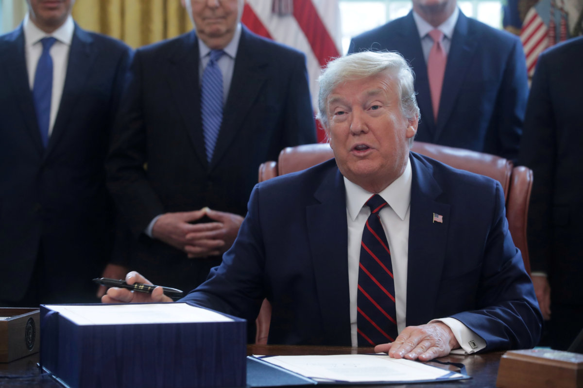 FILE PHOTO: U.S. President Trump hosts coronavirus aid bill signing