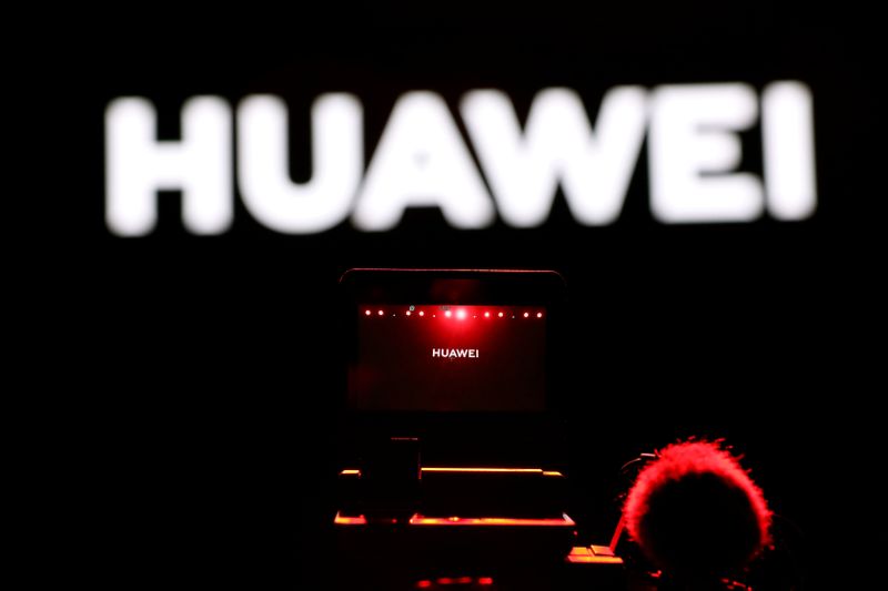 FILE PHOTO: Cameraman records during Huawei stream product launch event