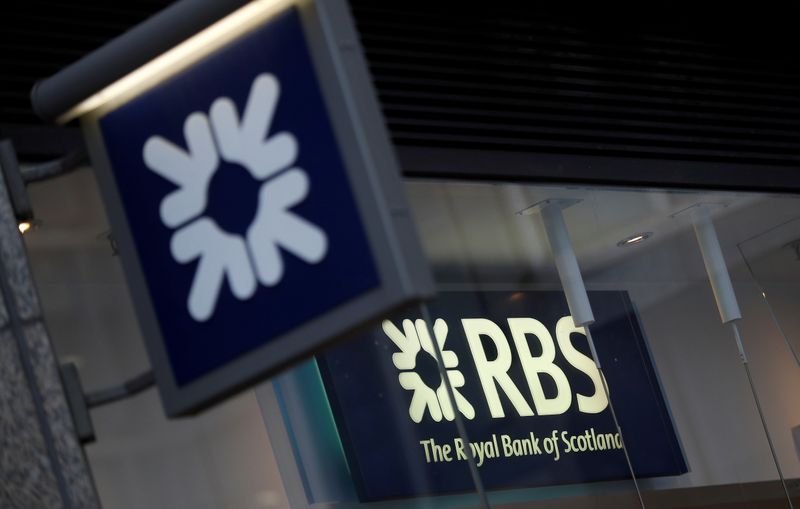FILE PHOTO: Royal Bank of Scotland signs are seen at