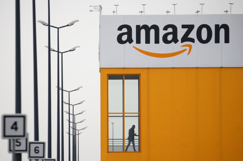 The logo of Amazon is seen at the company logistics