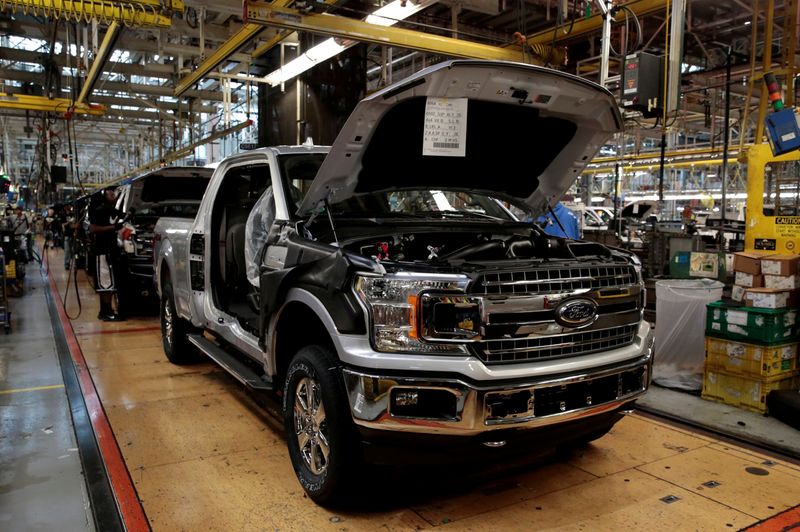 FILE PHOTO: 2018 F150 pick-up trucks move down the assembly