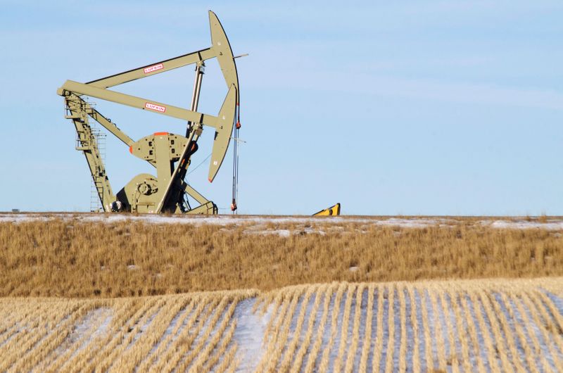 FILE PHOTO: An oil pumpjack operates near Williston