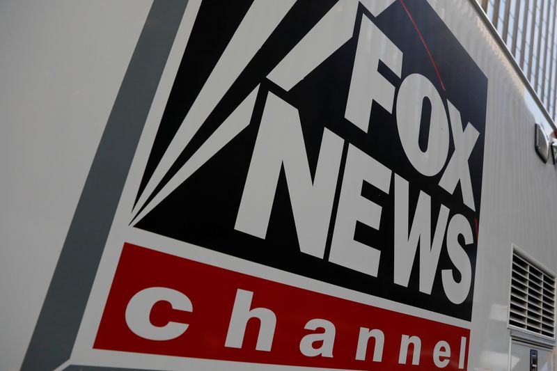 A Fox News channel sign is seen on a television