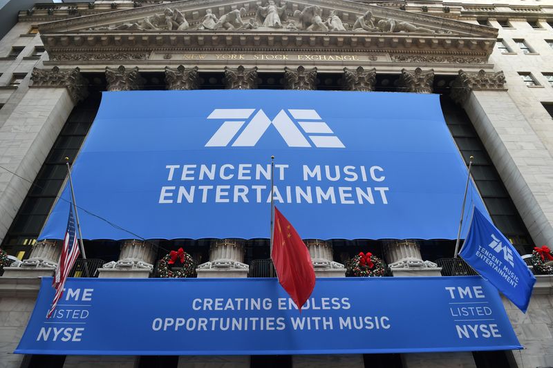 FILE PHOTO: Tencent Music Entertainment celebrates the company’s IPO at