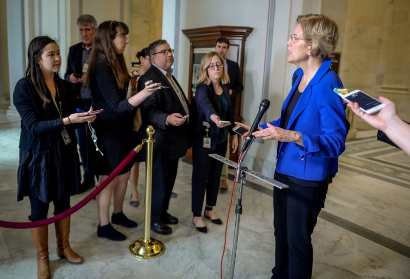 FILE PHOTO: Warren speaks to media after a meeting in