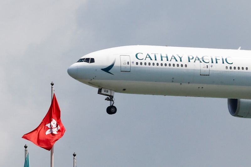 A Cathay Pacific Boeing 777 plane lands at Hong Kong
