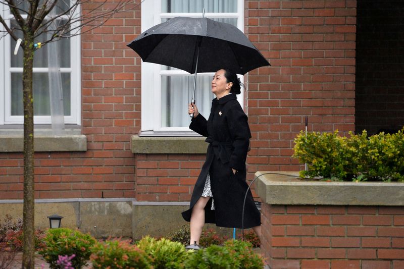 FILE PHOTO: Huawei Chief Financial Officer Meng Wanzhou leaves her