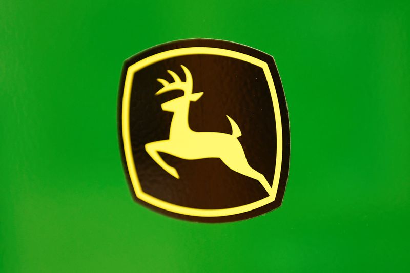 The leaping deer trademark logo is seen on John Deere