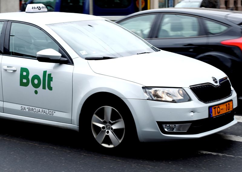 A Bolt (formerly known as Taxify) sign is seen on