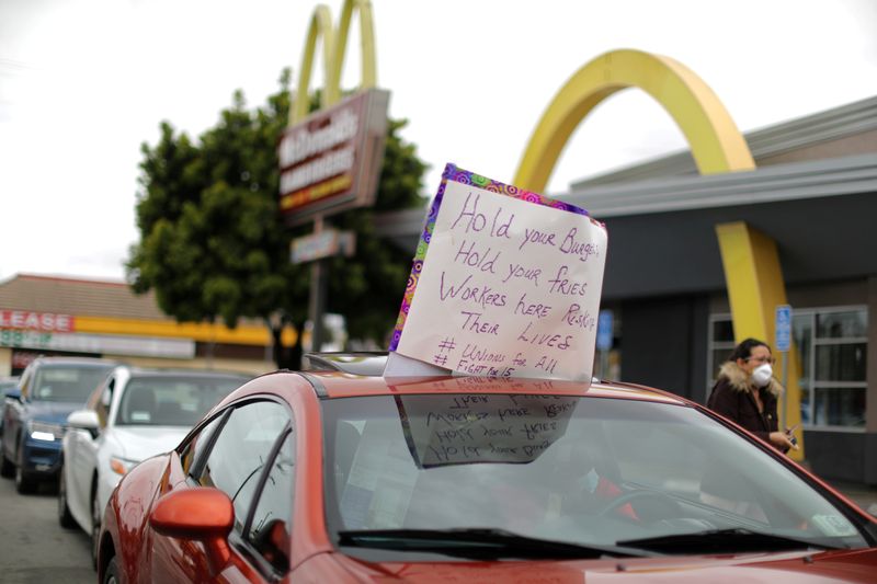 FILE PHOTO: McDonald’s workers strike for protective gear, as the