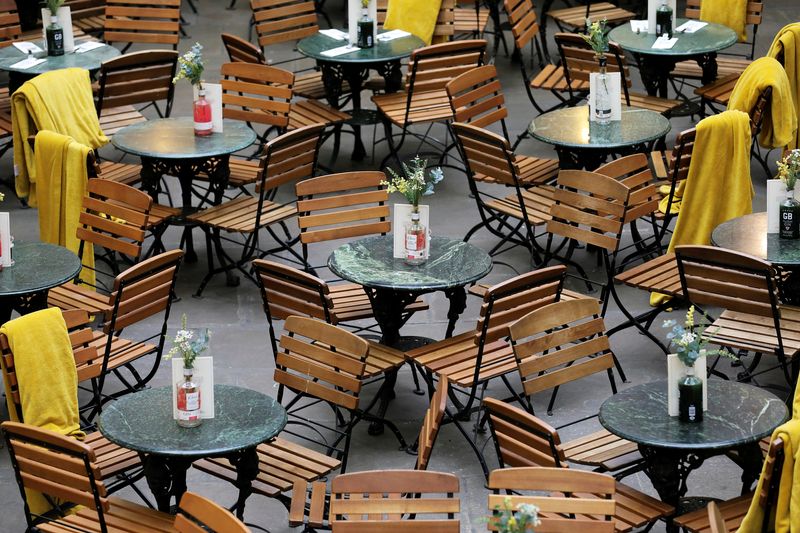 FILE PHOTO: Restaurant seats stand empty in Covent Garden in