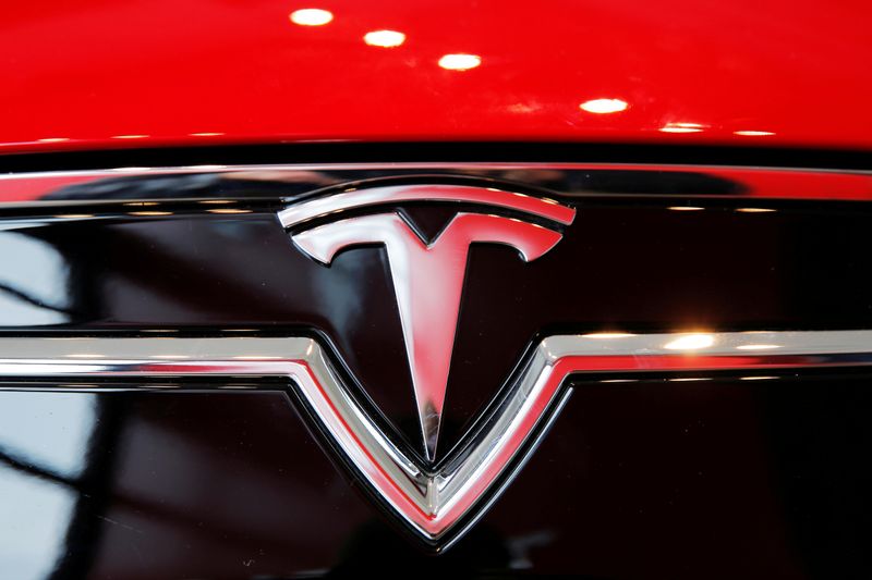 A Tesla logo on a Model S is photographed inside