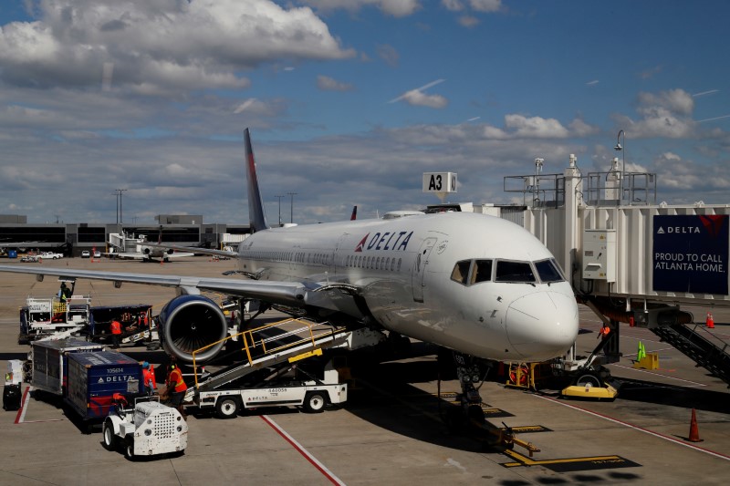 FILE PHOTO: A Delta Airlines plane is parked at a