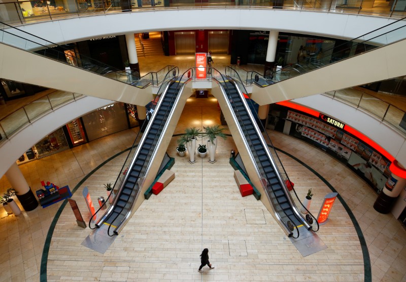 FILE PHOTO: A person is seen inside an empty shopping