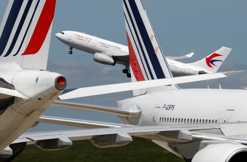 FILE PHOTO: Airplanes at Paris Charles de Gaulle airport in