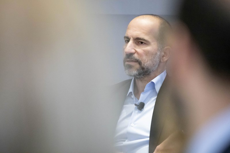 Uber CEO Dara Khosrowshahi attends a meeting with the Economic