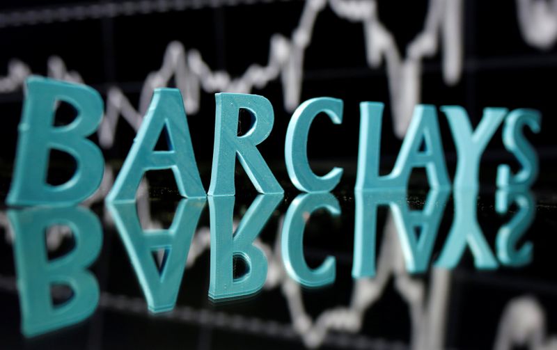 The Barclays logo is seen in front of displayed stock