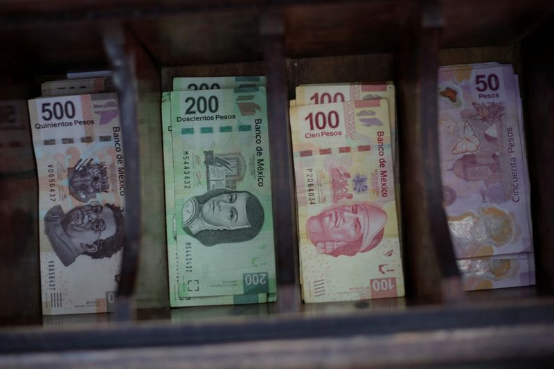 Mexican peso banknotes are pictured at a currency exchange shop