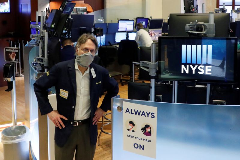 FILE PHOTO: Traders on the floor of the New York
