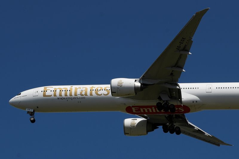 FILE PHOTO: An Emirates passenger plane comes in to land