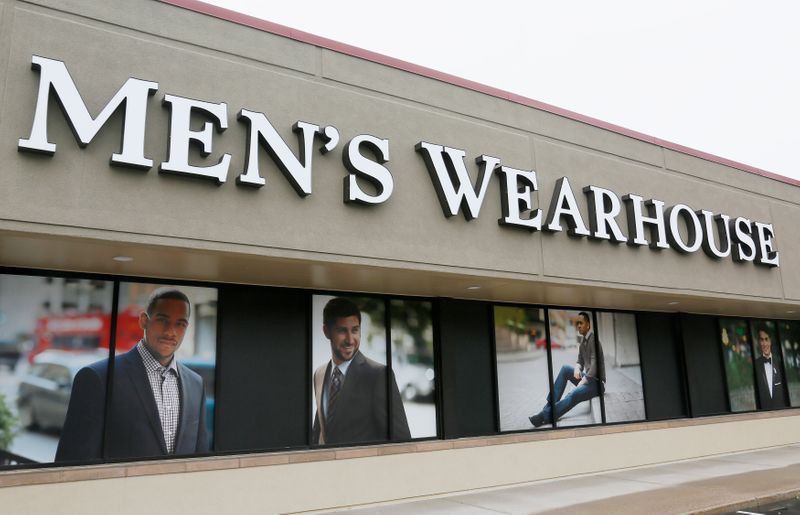 The Men’s Wearhouse sign is seen outside its store in