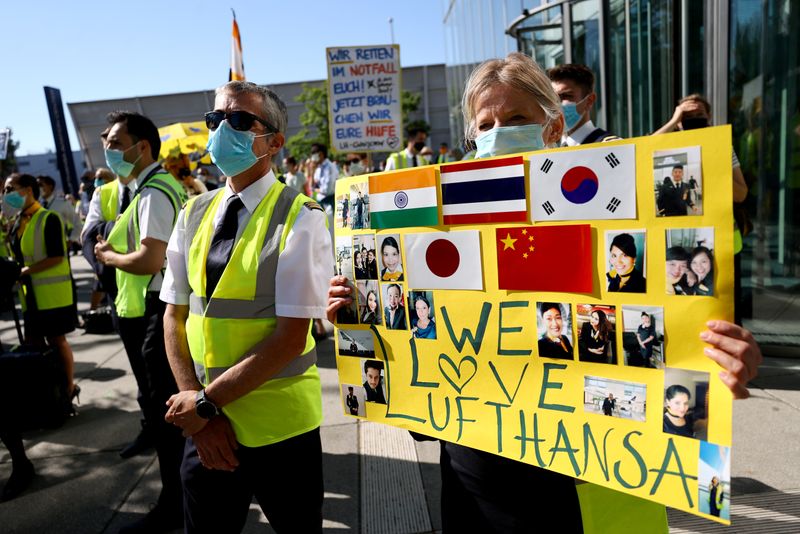 FILE PHOTO: Employees of Lufthansa protest against planned job cuts