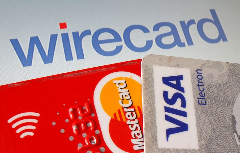 Mastercard and Visa credit cards are seen in front of