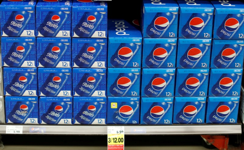 FILE PHOTO: Cans of Pepsi are pictured at a grocery