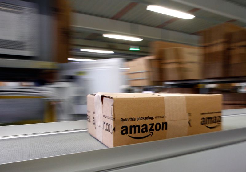 A parcel moves on the conveyor belt at Amazon’s logistics