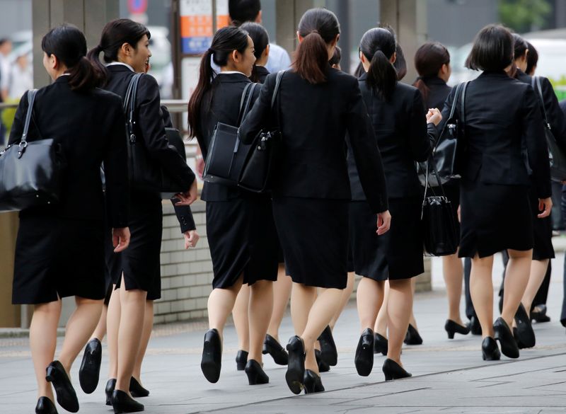 Female office workers wearing high heels, clothes and bags of