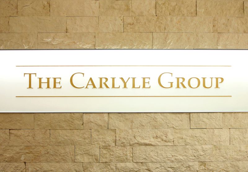 The logo of The Carlyle Group is displayed at the