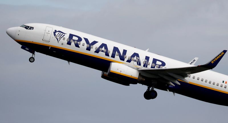 A Ryanair plane takes off from Manchester Airport as the