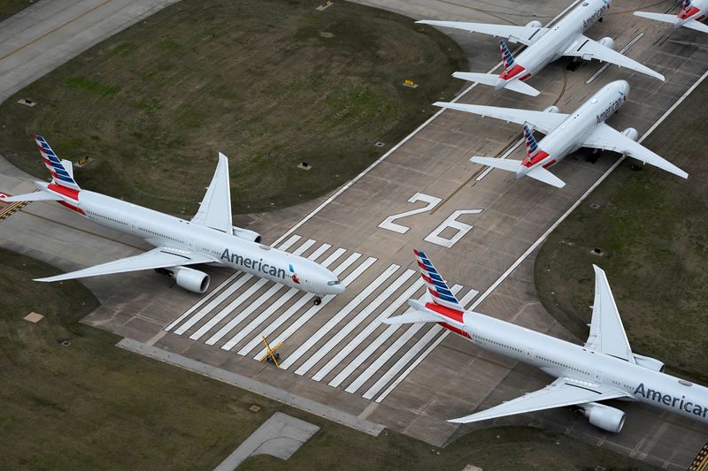 FILE PHOTO: American Airlines passenger planes crowd a runway in