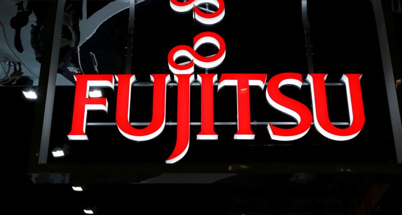 FILE PHOTO: The logo of Fujitsu is pictured at a