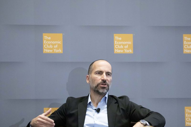 FILE PHOTO: Uber CEO Dara Khosrowshahi speaks during a meeting