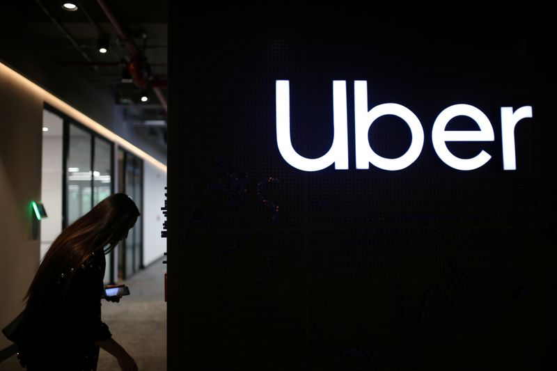 Uber’s logo is pictured at its office in Bogota