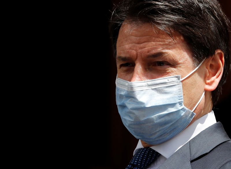 Italian Prime Minister Giuseppe Conte wearing a protective face mask,