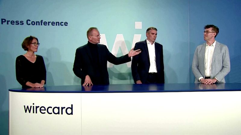 Members of the management board of Wirecard AG during a