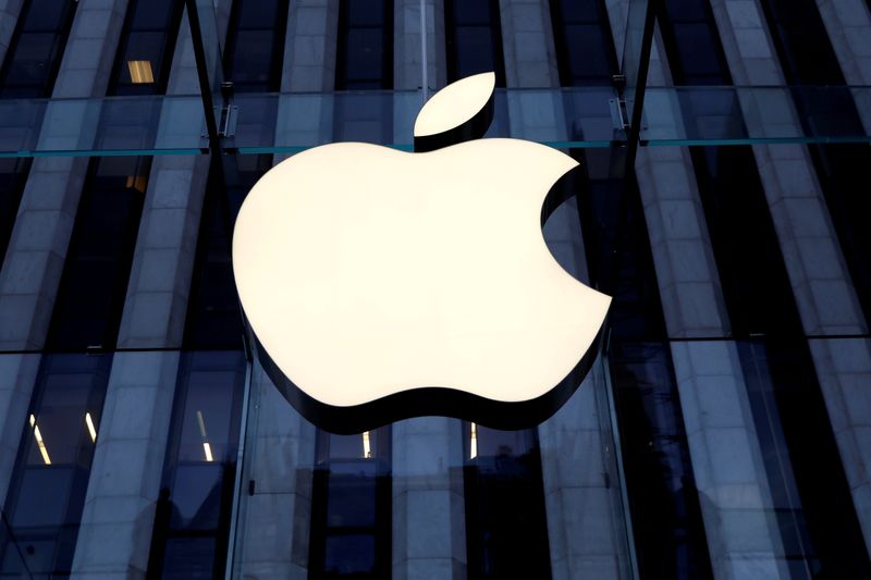 FILE PHOTO: The Apple Inc logo is seen hanging at