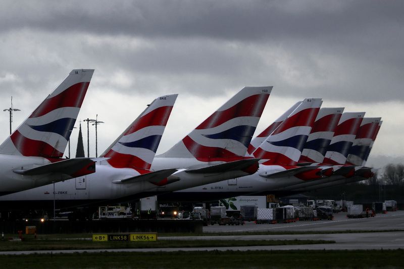 FILE PHOTO: BA planes tail fins are seen near Terminal