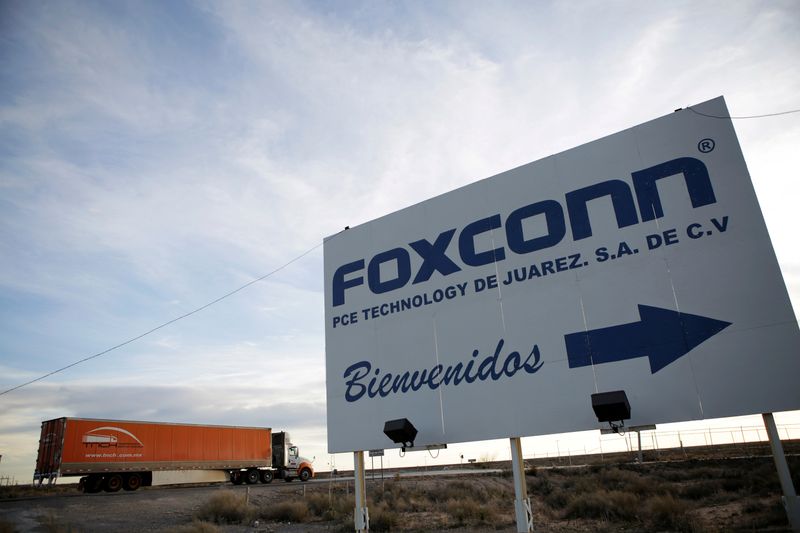 FILE PHOTO: A sign announces the manufacturing complex of Foxconn