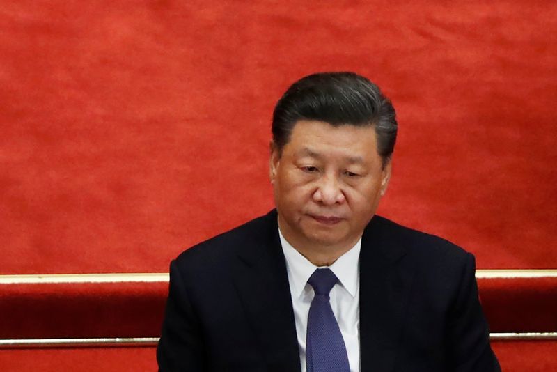 Chinese President Xi Jinping attends the opening session of CPPCC