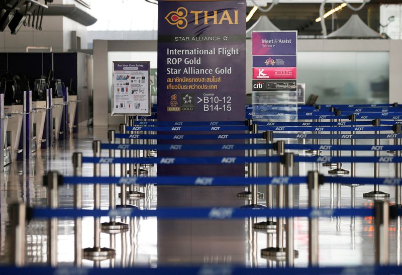 FILE PHOTO: Empty lines are seen at Thai Airways counters