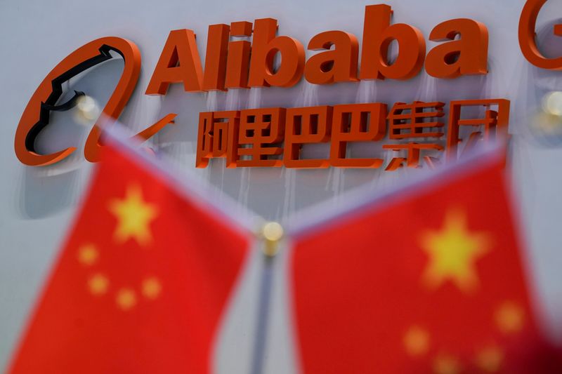 FILE PHOTO: FILE PHOTO: A logo of Alibaba Group is