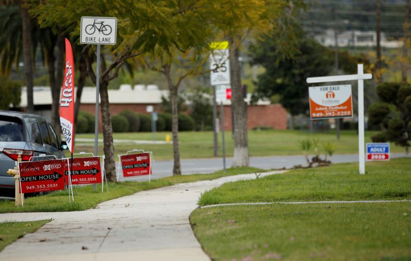 FILE PHOTO: Signs advertising an open house in Pasadena are