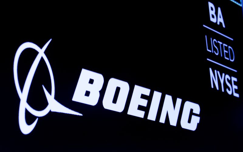The Boeing logo is displayed on a screen at the