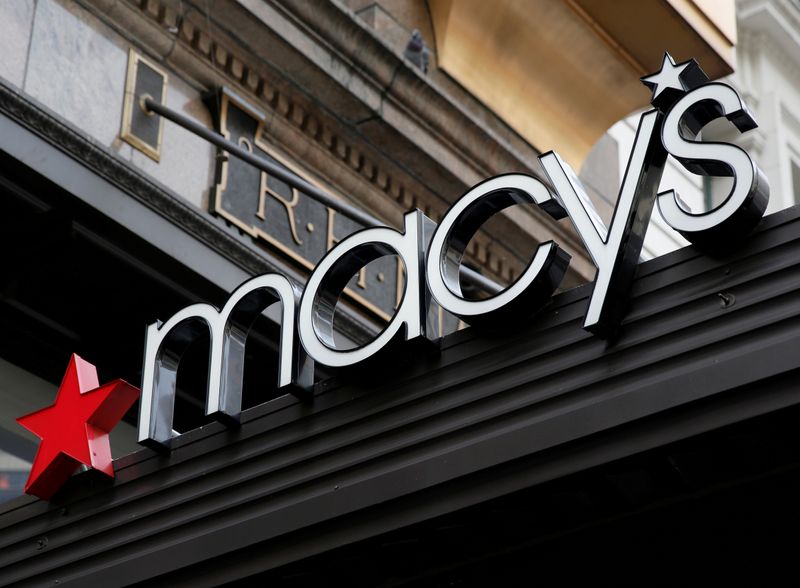 A sign that marks the Macy’s store is seen at