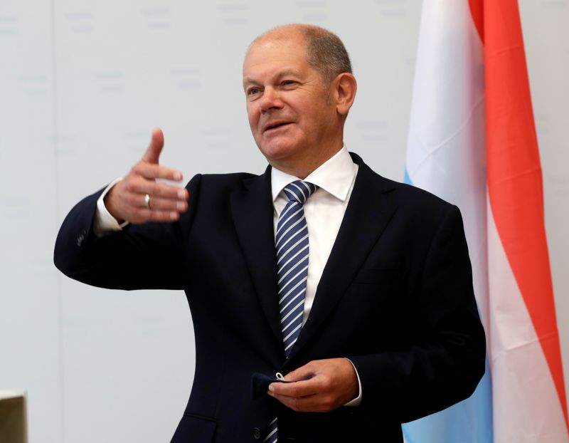 FILE PHOTO: German Finance Minister Scholz attends a news conference